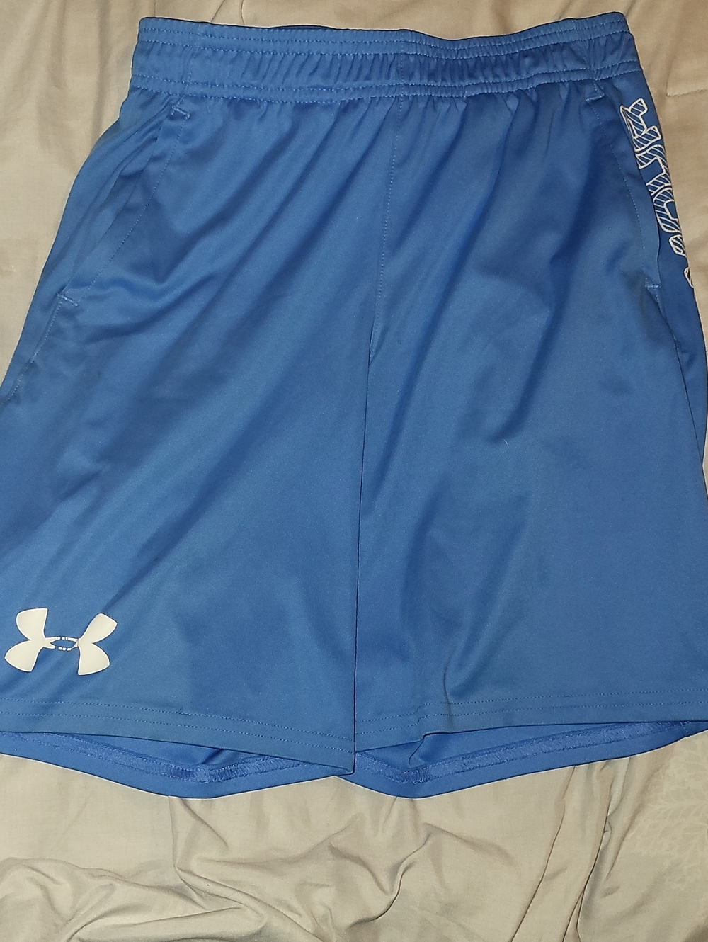 Under Armour Youth Royal Blue Athletic Shorts with White Logo